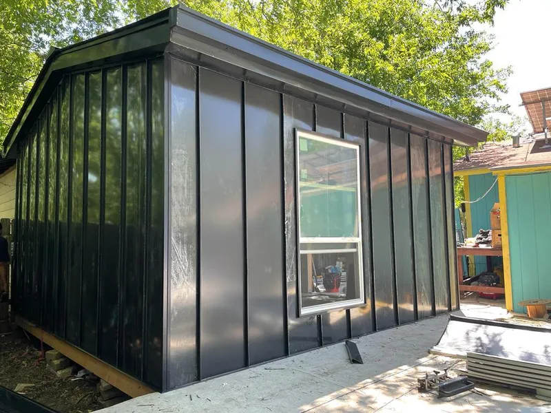 Black standing seam metal wall panels for Roof Inspection in Big Rapids