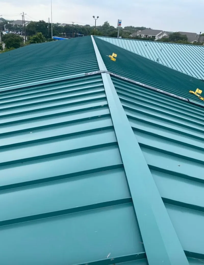 Green commercial metal roof ridge and valley for Metal Roof Repair in Big Rapids